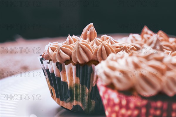 Close up of cupcakes with pink frosting