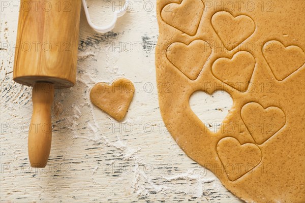 Heart shape cut from cookie dough