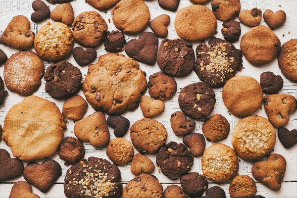 Variety of cookies on wooden table