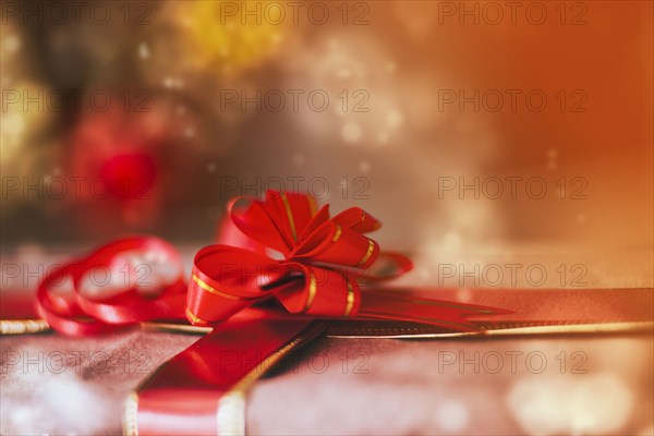 Close up of red bow on Christmas gift