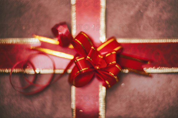 Close up of red bow on Christmas gift