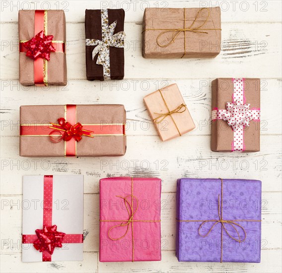 Wrapped gifts on wooden table