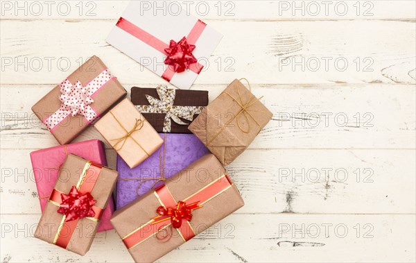 Wrapped gifts on wooden table