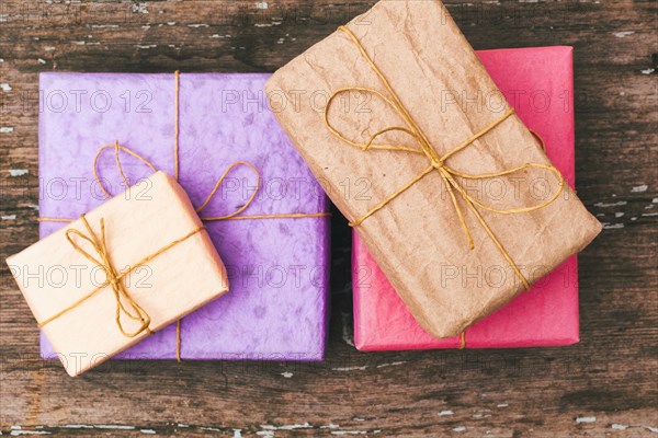 Wrapped gifts on wooden table