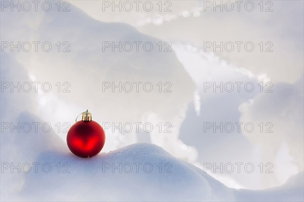 Christmas ornament on snow