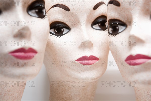 Three female mannequin heads