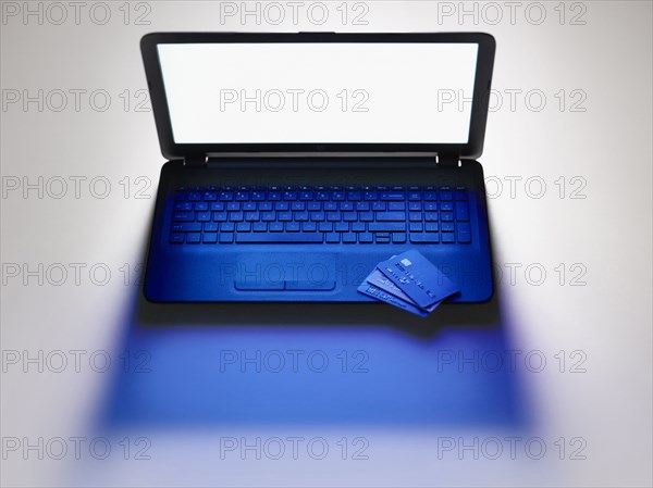 Credit cards on laptop computer