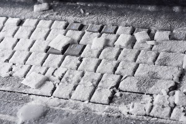 Ice on frozen laptop keyboard