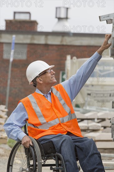 Caucasian engineer working on construction site