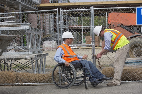 Caucasian engineers working on construction site