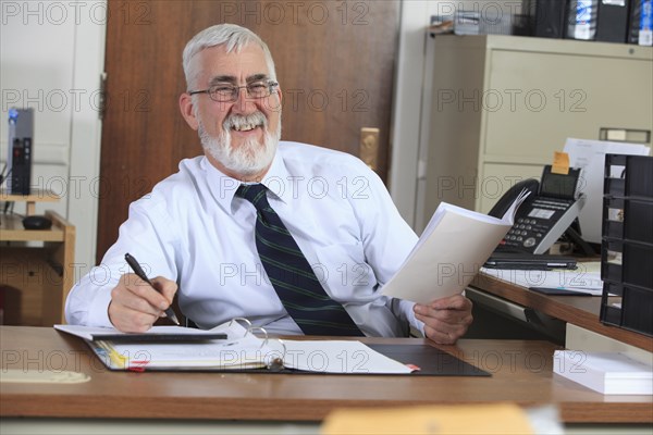 Caucasian businessman working in office