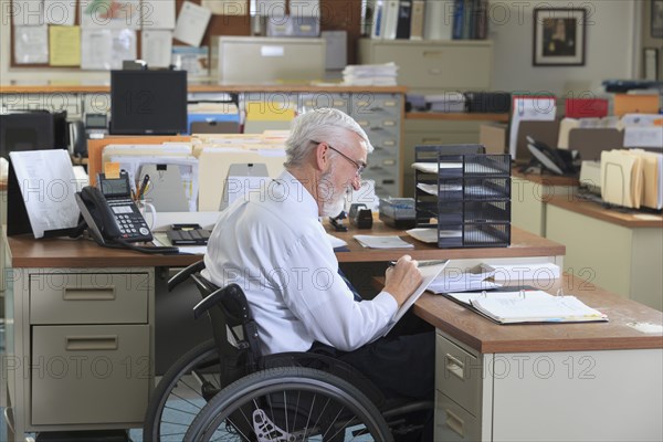 Caucasian businessman working in office