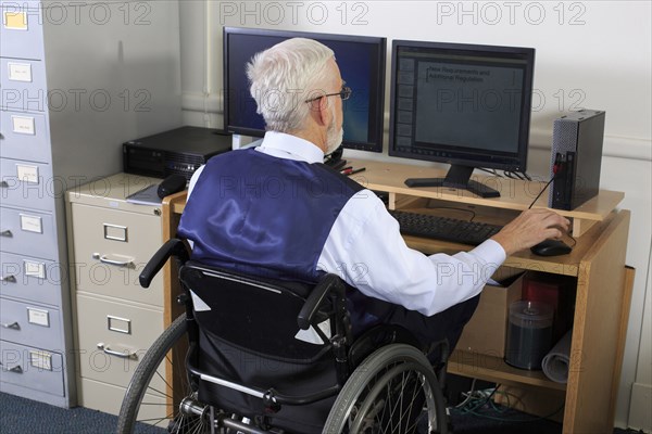 Caucasian businessman working at desk