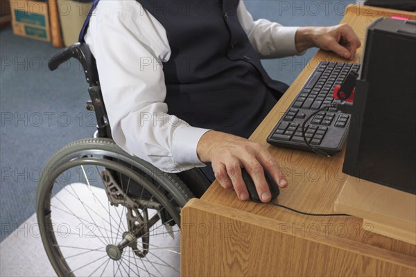 Caucasian businessman working at desk