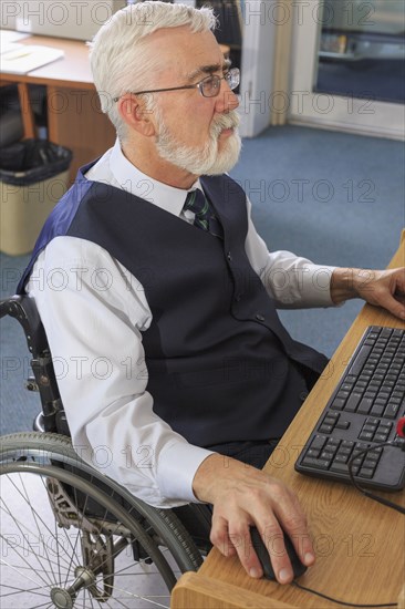 Caucasian businessman working at desk