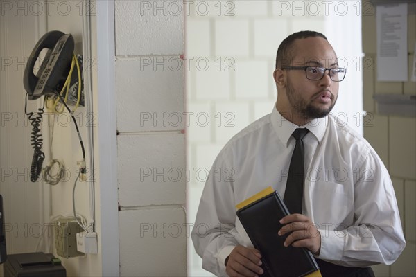 Mixed race server working in restaurant