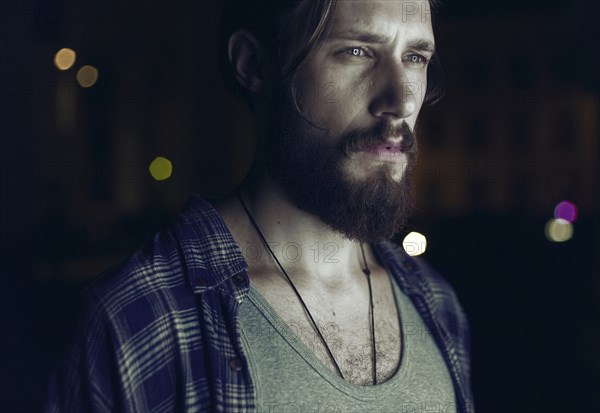 Portrait of pensive Caucasian man with beard