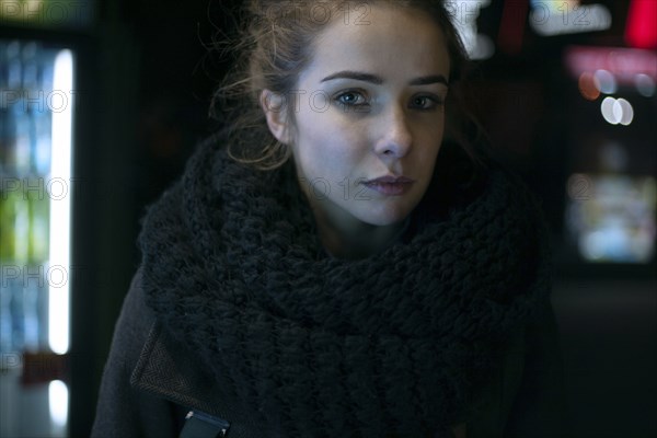 Portrait of serious Caucasian woman wearing scarf