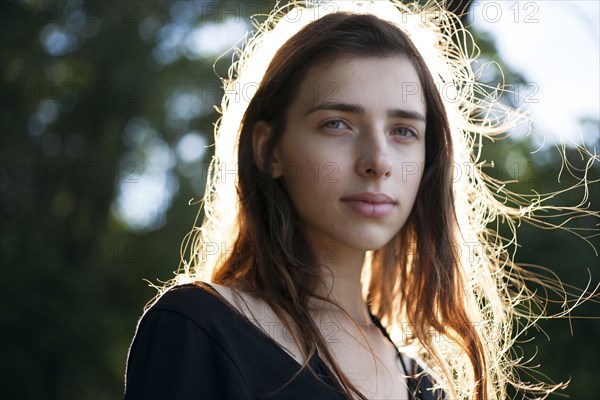 Wind blowing hair of Caucasian woman