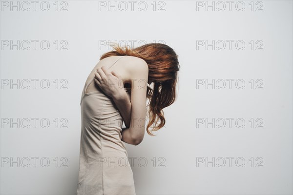 Caucasian woman looking down