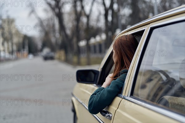 Caucasian woman driving car