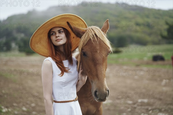 Woman petting horse