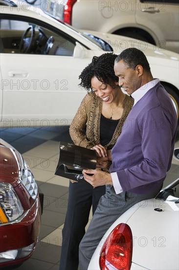 Couple buying a car