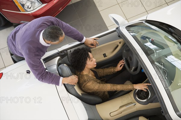 Couple buying a car