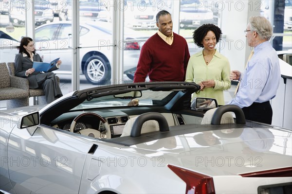 Couple buying a car