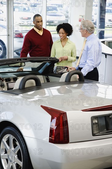 Couple buying a car