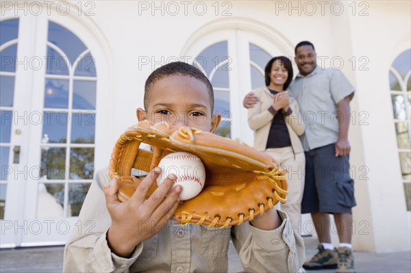 African American boy with baseball and glove
