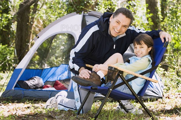 Father and daughter camping