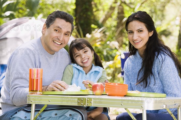 Hispanic family camping