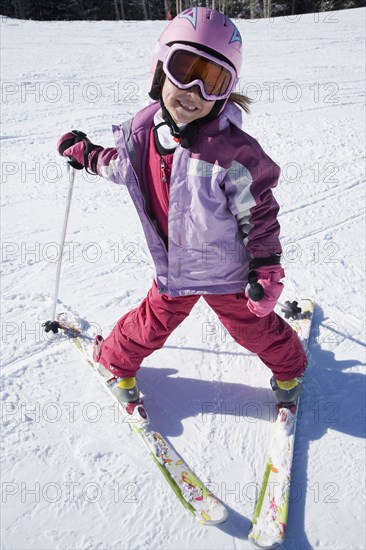 Asian girl on skis