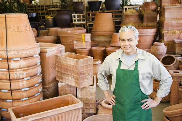 Hispanic man working at garden center