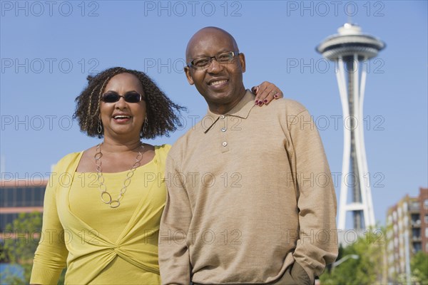 African American couple hugging