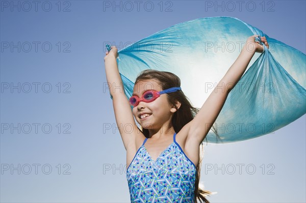 Asian girl in bathing suit with scarf