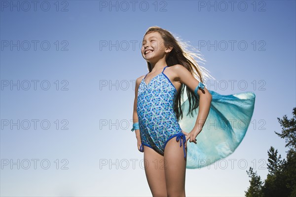 Asian girl in bathing suit with scarf