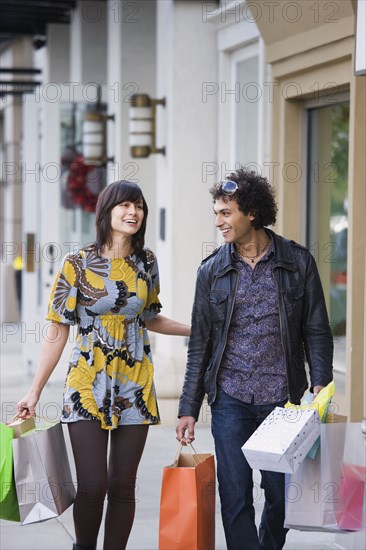 Happy couple shopping