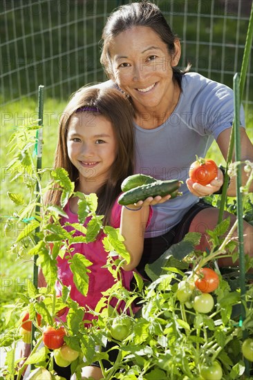 Japanese mother and daughter gardening