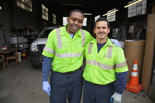 Sanitation workers in garage