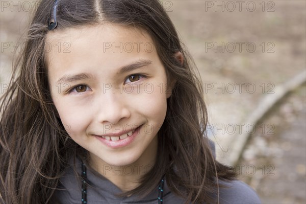 Smiling mixed race girl