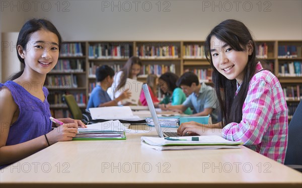 Students working together in library