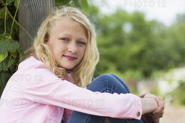 Caucasian girl smiling outdoors