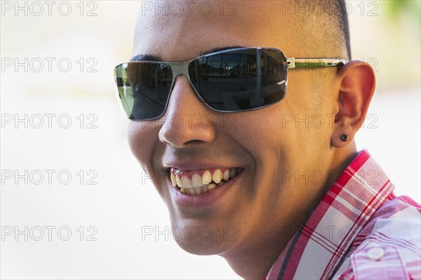 Hispanic boy smiling outdoors