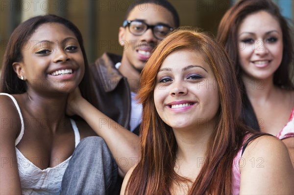 Teenagers smiling outdoors