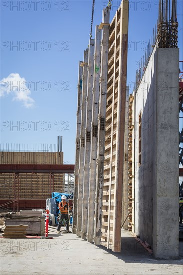 Caucasian worker by wall form at construction site