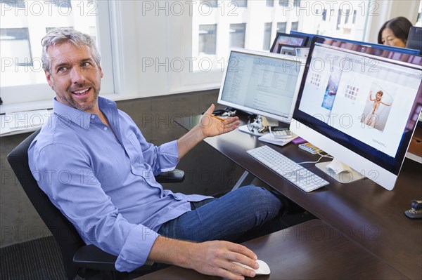 Businessman working at computer in office