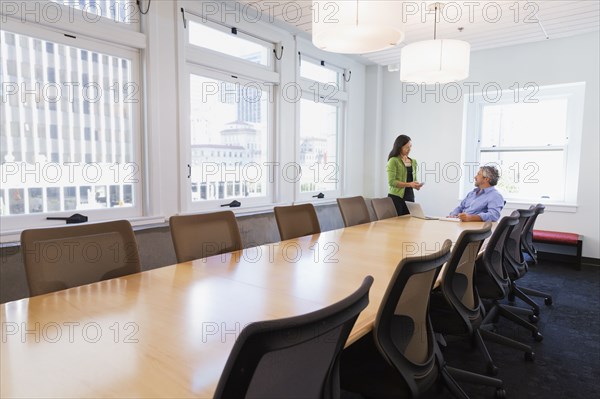 Business people talking in conference room