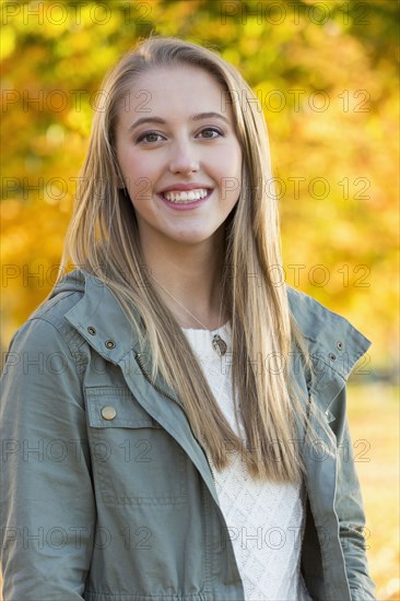 Caucasian woman smiling in park